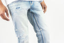 Light Sand Blue flared jeans with distress. By Fresh N Fitted.