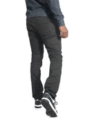 Person wearing dark gray pants and a gray sweatshirt on a white background