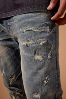 Men's Jordan Craig Geo Storm Collins straight fit denim jeans in Desert Blue, showcasing the stylish denim fabric and fit.