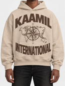 KML INTERNATIONAL boxy cream and brown hoodie with long sleeves and relaxed fit, casual style, front pocket.