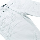 White jeans with a brand label on a white background. By Fresh N Fitted