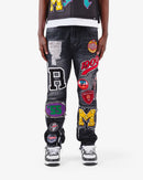 Black wash straight fit denim jeans by VOYAGE STUDIO with patch artwork and classic denim texture.