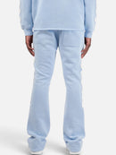 Copper Rivet Saint Patched Stacked Sweats In Light Blue