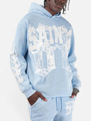 Copper Rivet Saint Patched Cropped Hoodie In Light Blue