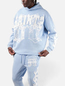 Copper Rivet Saint Patched Cropped Hoodie In Light Blue