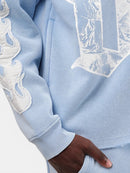 Copper Rivet Saint Patched Cropped Hoodie In Light Blue
