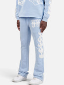 Copper Rivet Saint Patched Stacked Sweats In Light Blue