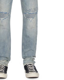 Ksubi Chitch Astral Intruder blue denim jeans with distressed details and classic five-pocket design.