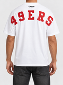 White Pro Standard San Francisco 49ers Wingspan T-shirt with drop shoulder design and team logo graphic.