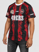 Red and black Pro Standard San Francisco 49ers Ultras poly all-over print T-shirt with team logo and design details.