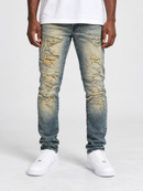 Jordan Craig Sean 'Alkaline' fit denim jeans with shredded details in desert color, featuring distressed style and classic denim look.