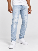 Jordan Craig Alexander Rip and Repair Denim jeans in lightning blue, showcasing distressed denim with rips and repair details.