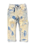 A pair of light-wash blue jeans with a bleached yellow finish and distressed patches, shown flat against a white background. By Fesh N Fitted.