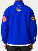 Pro Standard Golden State Warriors royal blue pre-game zip wind jacket with team logo and athletic fit.