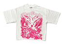 A white short-sleeve t-shirt with a large pink graphic print on the front. The graphic features the gothic-style text 'Silent Verse' above a distressed, swirling pink design resembling a winged creature or abstract art. By Fresh N Fitted.
