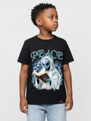 A young boy wearing a black graphic t-shirt with a white alien and the word 'PEACE' printed on the front, paired with light blue jeans, set against a plain light gray background.