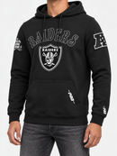 Black Pro Standard Las Vegas Raiders Rebel hoodie with front logo and drawstring hood, styled in a studio portrait.