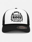 MUKA 'Keep Challenging' Trucker Hat in White/Black