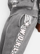 Copper Rivet World Tour Fray Applique Sweatpants In Grey