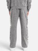 Copper Rivet World Tour Fray Applique Sweatpants In Grey