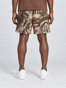 Rebel Minds Weeping Liberty brown board shorts with floral patterns, displayed flat on a white background.