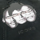 Black hoodie with graphic of three faces and 'Greatest of All Time' text on a dark background. 