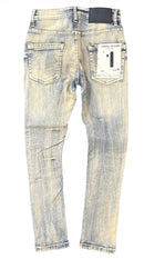 Vintage blue denim jeans with a brand label on a white background. by Fresh n Fitted