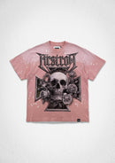 A pink short-sleeve graphic t-shirt featuring a large black and white design of a skull, roses, and an Iron Cross, with the word 'Kreistrom' printed above. The t-shirt has a distressed, splattered finish and is displayed flat against a light gray textured background. By Fresh N Fitted.