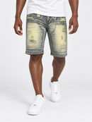 Makobi Prego denim shorts in dirt color, showcasing distressed denim with frayed edges and casual fit for stylish summer wear.