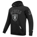 Black Pro Standard Las Vegas Raiders Rebel hoodie displayed on a model, featuring team logo and front pocket.