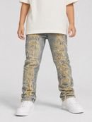A child wearing light-wash distressed denim jeans with prominent gold metallic thread embroidery running down the front of both legs, styled with a cream t-shirt and white sneakers against a light gray studio background.