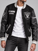 Black Pro Standard Las Vegas Raiders split logo varsity jacket with ribbed cuffs and collar, front button closure, and embroidered team details.