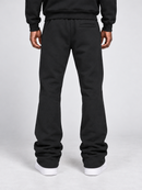 Black Spark 'No Risk No Reward' stacked sweatpants, men's casual athletic joggers with tapered fit and drawstring waistband.