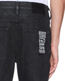 Ksubi Van Winkle backstage black Kraftwerk denim jeans with a slim fit, showcasing the back view and signature stitching details.