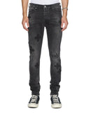 Ksubi Van Winkle Blakk Metal Paise denim jeans with distressed detailing and metal accents, displayed on a mannequin.