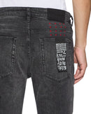 Ksubi Van Winkle Blakk Metal Paise denim jeans with distressed details and metal accents, showcasing a slim fit and classic denim style.