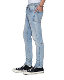 Ksubi Van Winkle Kasper blue denim jeans with distressed detailing and classic five-pocket design, front view.