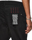 Ksubi WolfGang Laid black denim jeans, slim fit cut with distressed details, showcasing the stylish denim from the front view.