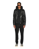 Ksubi WolfGang Laid black denim jeans with distressed details and classic five-pocket design displayed on a model.