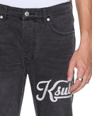 Ksubi Chitch Powder Grey Outfield Denim jeans in charcoal, showing the fit and denim texture with subtle branding details.
