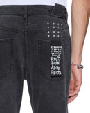 Ksubi Chitch Powder Grey Outfield denim jeans in charcoal, showing the fit and fabric texture of the denim pant.