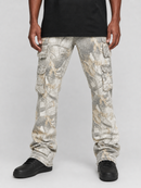 A person wearing light gray and beige camouflage cargo pants with a black t-shirt and black sneakers, shown from the waist down against a light gray studio background.