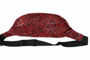 Red snake skin patterned belt bag on a white background