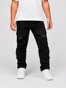 A child wearing black cargo pants with multiple flap pockets, styled with a white t-shirt and white sneakers against a light gray studio background.