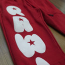 Kids RAWYALTY KIDS 'RAW' sweatpants in red, comfortable and stylish with an elastic waistband, perfect for active kids.