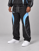 RARE PEACE black nylon joggers with embossed detailing, boxy sweatpants shown in studio shot