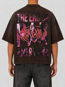 Rare Peace Dark Age 2.0 oversized rhinestone cropped T-shirt in dark brown, featuring a bold graphic design on the front.