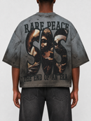 A person shown from the back wearing a faded gray graphic T-shirt with large distressed lettering reading 'RARE PEACE' and 'SOS' with 'THE END OF AN ERA' below, paired with dark jeans against a plain light background. Fresh N Fitted Sacramento California