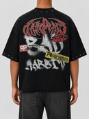 Black oversized rhinestone T-shirt by Rare Peace featuring a Statue of Liberty graphic on the front.