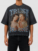 Rare Peace oversized rhinestone cropped T-shirt in dark grey with "Trust No One" slogan, stylish and casual streetwear.
